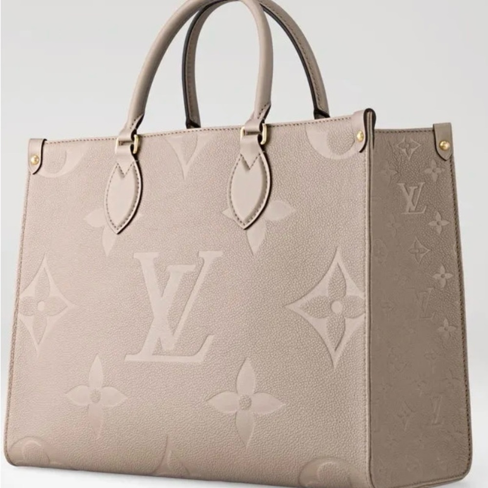 ** SOLD **. Louis Vuitton Taupe Monogram “On The Go” Medium (GM)
